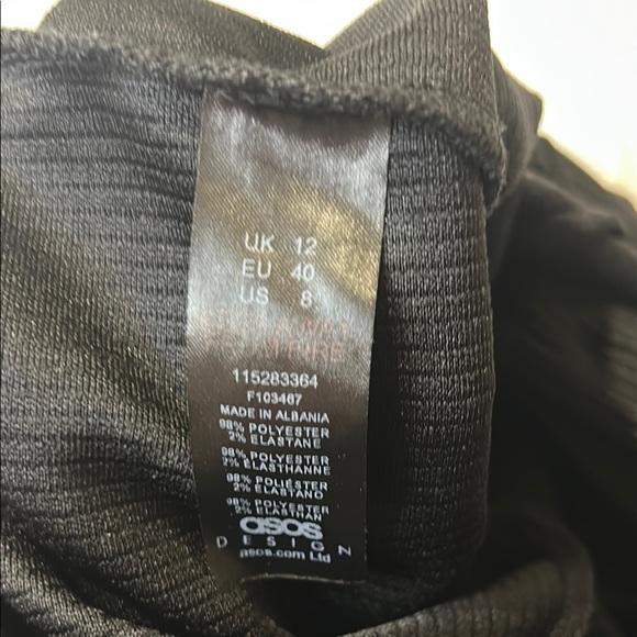 ASOS Black Jumpsuit with Wide-Leg Pants and V-Neck. Button front. Open back. 8 - Picture 12 of 12